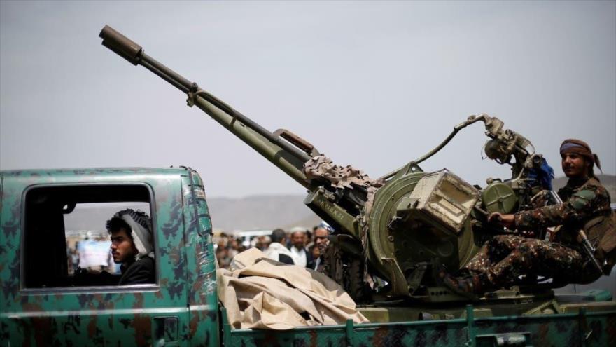 Combatientes del movimiento popular Ansarolá de Yemen en Saná, la capital.