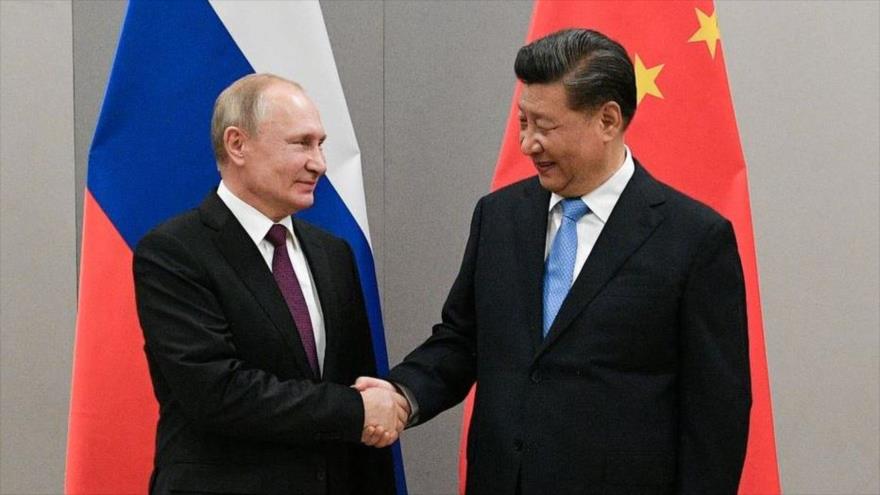 Presidente ruso, Vladimir Putin, y presidente chino, Xi Jinping, en una reunión, en Brasilia, Brasil, 13 de noviembre de 2019. (Foto: Reuters)