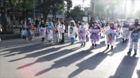 Marchan en la Ciudad de México en 88º Acción Global por Ayotzinapa