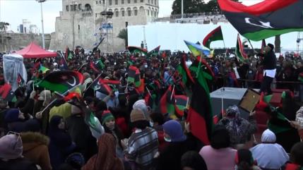 Libios recuerdan aniversario de su revolución y piden la democracia