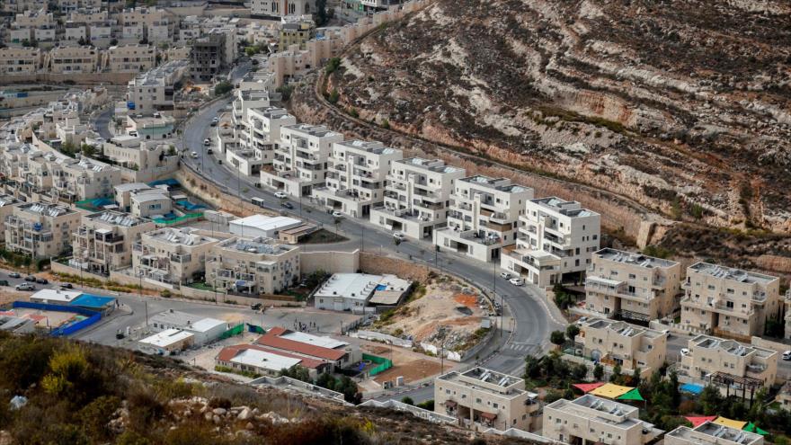 Construcción del asentamiento israelí de Givat Zeev, en la Cisjordania ocupada, 28 de octubre de 2021. (Foto: AFP)