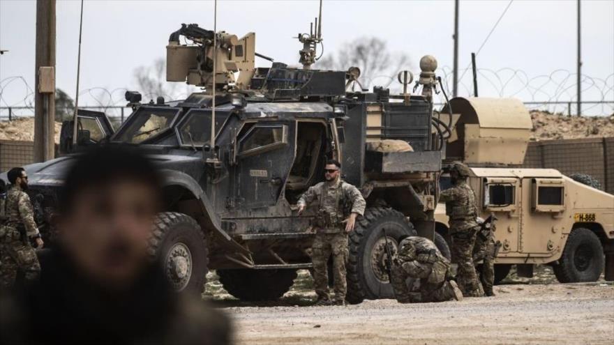 Soldados estadounidenses cerca del campo petrolero Al-Omar en la provincia siria de Deir Ezzor, 23 de marzo de 2019. (Foto: Getty Images)