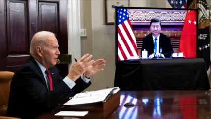 Inquieto ante alianza Rusia-China, Biden amenaza a Pekín con costes
