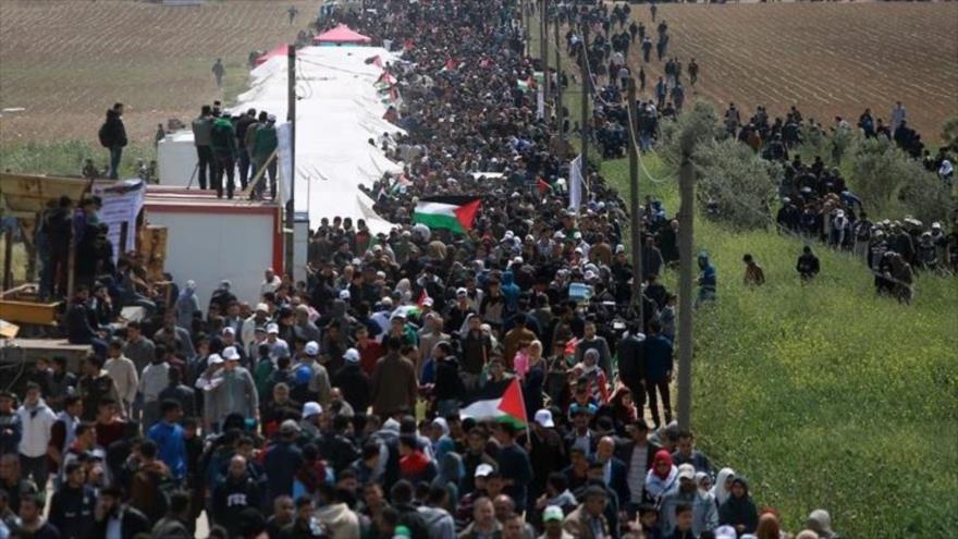 Palestinos conmemoran el aniversario del Día de la Tierra Palestina con una marcha en Gaza y los territorios ocupados, 26 de marzo de 2022. 