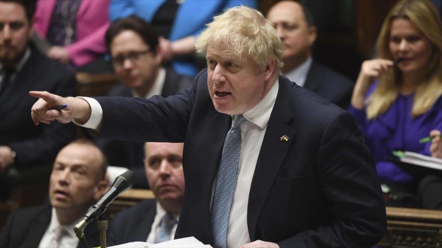El primer ministro británico, Boris Johnson, en una sesión de la Cámara de los Comunes en Londres, 30 de marzo de 2022. (Foto: AP) 