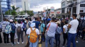 Gobierno de Honduras despide al personal no esencial por deudas