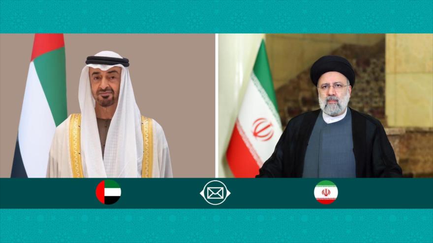 El presidente de Irán, Seyed Ebrahim Raisi (dcha.), y el nuevo presidente de los Emiratos Árabes Unidos (EAU), Muhamad bin Zayed Al Nahyan.