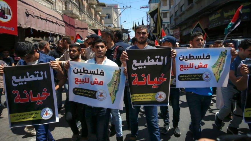 Palestinos se manifiestan contra normalización de lazos con Israel en la Franja de Gaza, 14 de agosto de 2020. (Foto: AFP)