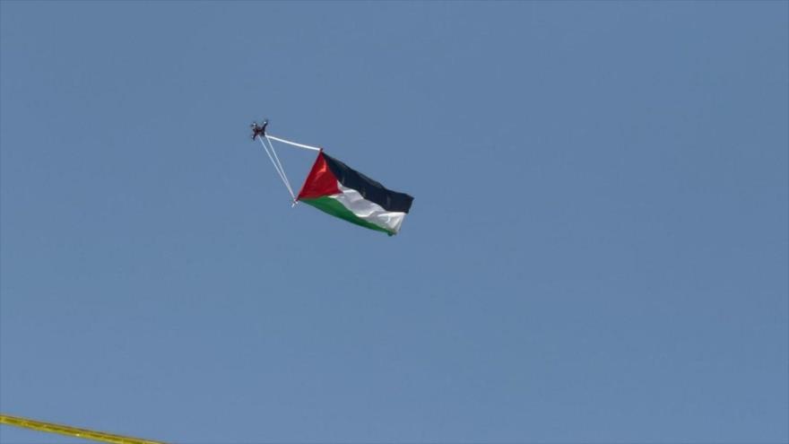 Vídeo: enarbola bandera de Palestina en cielo de Al-Quds | HISPANTV