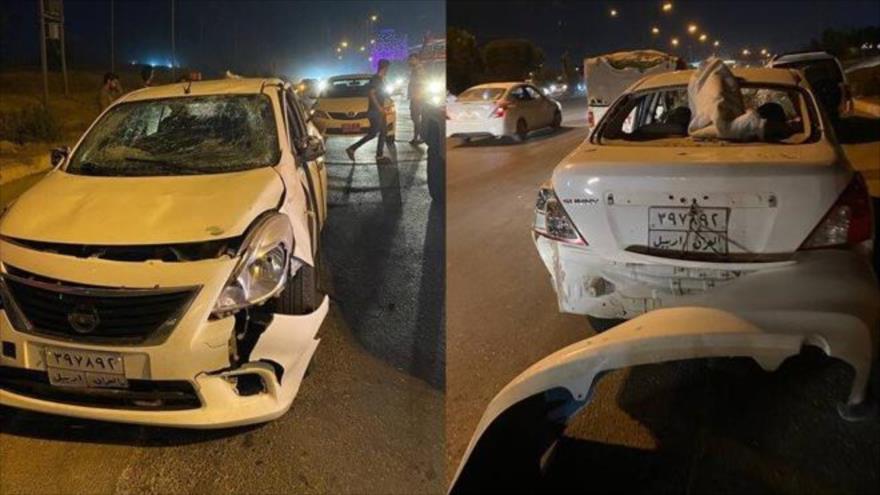 Un vehículo dañado por ataque de un dron cerca del consulado de EE.UU., en Erbil, Kurdistán iraquí, 8 de junio de 2022.