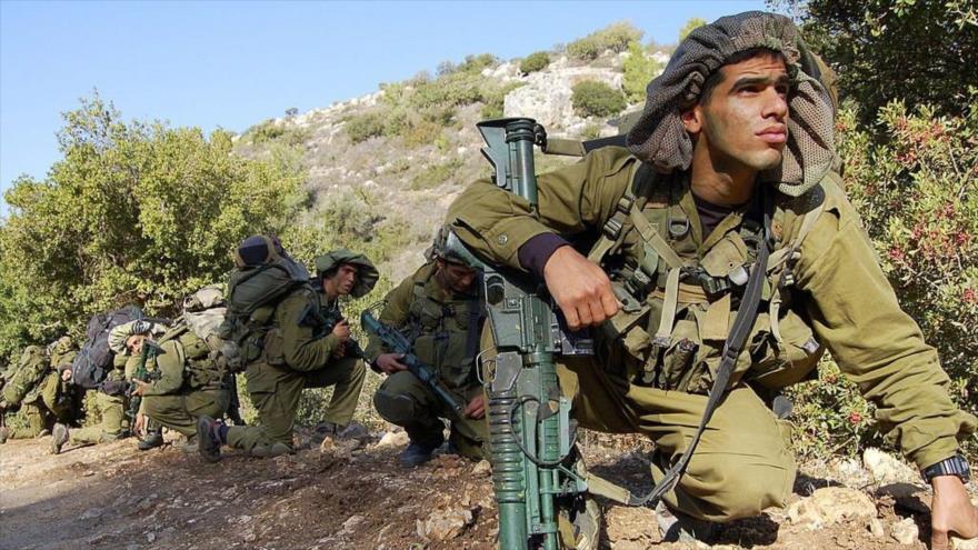 Soldados israelíes participan en un ejercicio de entrenamiento en los altos del Golán sirio. (Foto: Getty Images)