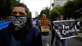 Miles de mexicanos marchan para pedir justicia por caso Ayotzinapa