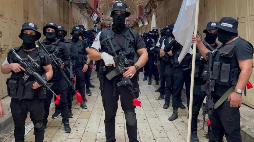 Combatientes del grupo palestino la Guarida de los Leones en la ciudad vieja de Nablus, en
Cisjordania.