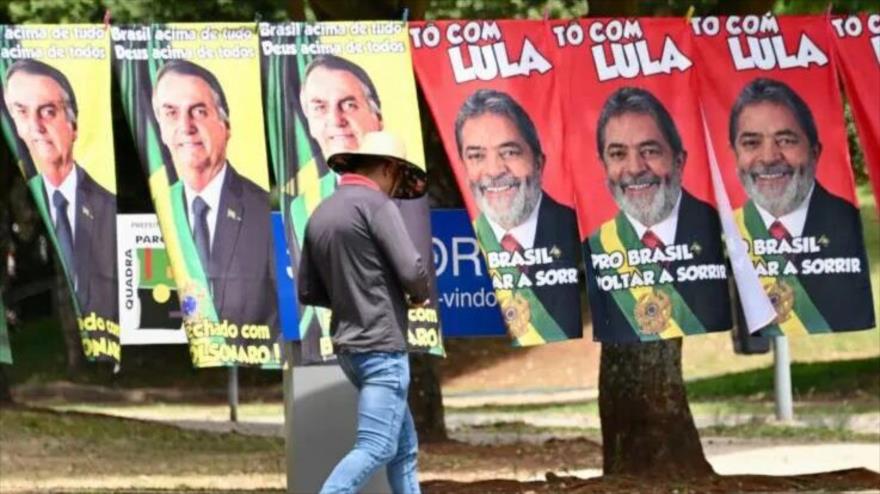 Imágenes de los dos candidatos presidenciales de Brasil, el izquierdista Luiz Inácio Lula da Silva y el ultraderechista Jair Bolsonaro.