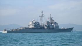 China expulsa un buque de guerra de EEUU de aguas en disputa