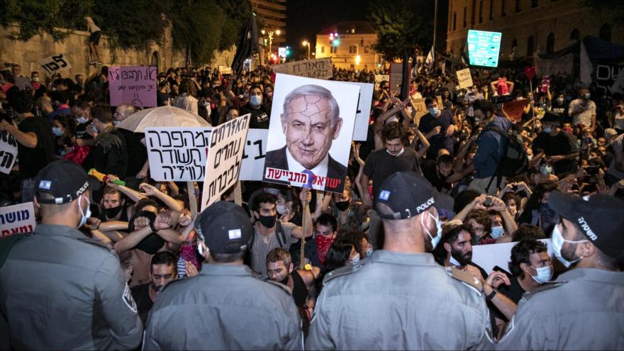 Israelíes en una protesta contra Benjamín Netanyahu en Al-Quds (Jerusalén).