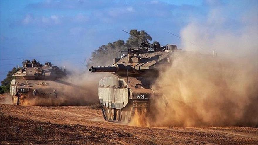  Tanques israelíes desplegados cerca de la Franja de Gaza.