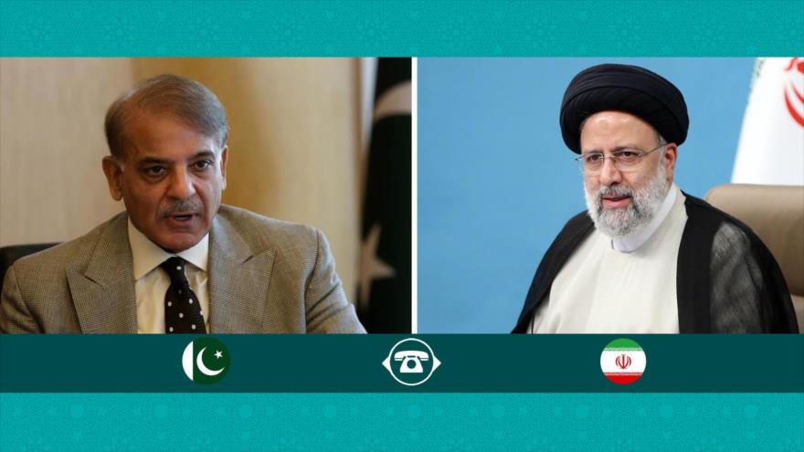 El presidente de Irán, Seyed Ebrahim Raisi (dcha.), y el primer ministro de Pakistán, Shahbaz Sharif.