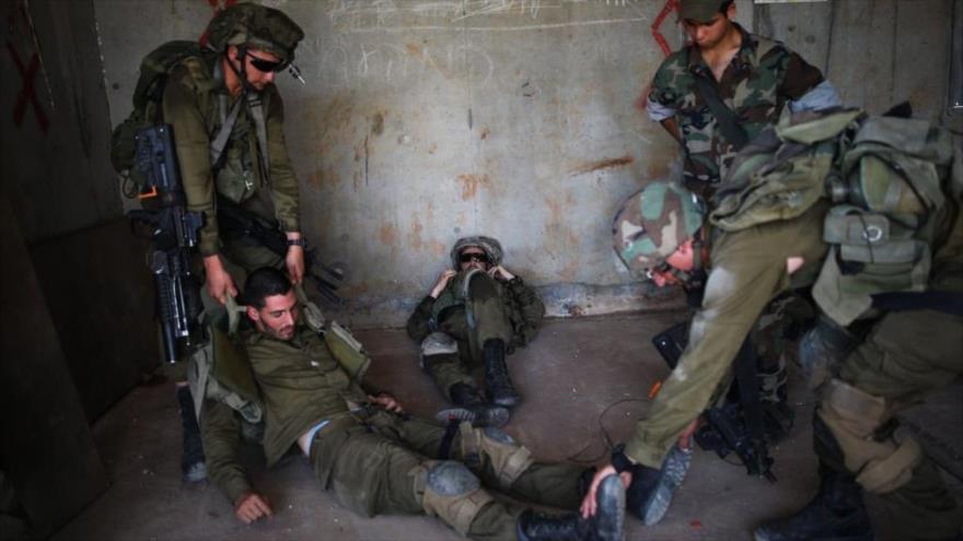 Soldados de la brigada golani del ejército israelí participan en ejercicios militares en el norte de los territorios ocupados, 16 de mayo de 2017.