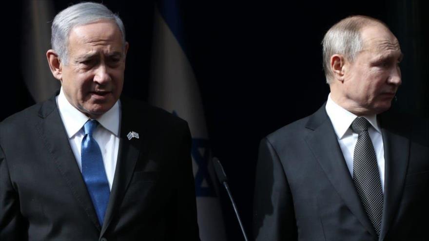 El presidente ruso, Vladimir Putin, y el primer ministro israelí, Benjamín Netanyahu, en una reunión en Al-Quds (Jerusalén), 23 de enero de 2020.