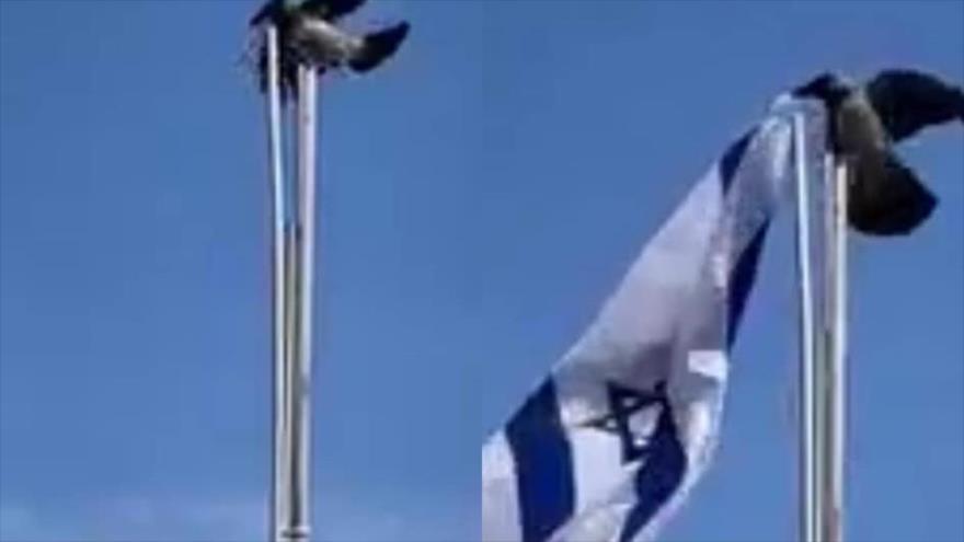 Cuervo desmonta la bandera del régimen israelí y la tira al piso