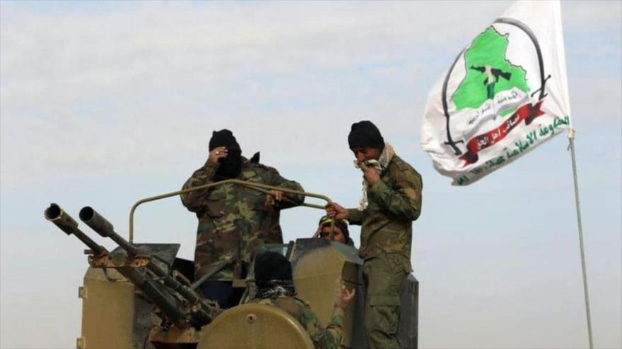 Miembros del el movimiento iraquí Asaib Ahl al-Haq.