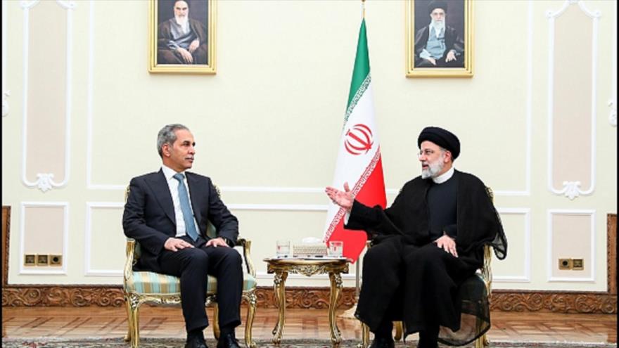 El presidente iraní, Seyed Ebrahim Raisi (dcha.), se reúne con el presidente del Consejo Judicial de Irak, Faeq Zeidan, en Teherán, 9 de mayo de 2023.