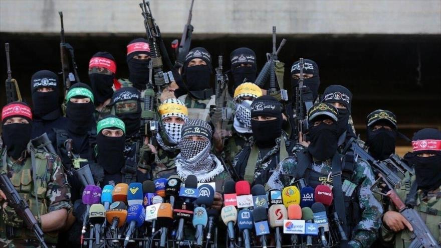 Combatientes de diferentes grupos de la Resistencia palestinos durante una rueda de prensa en Gaza. 