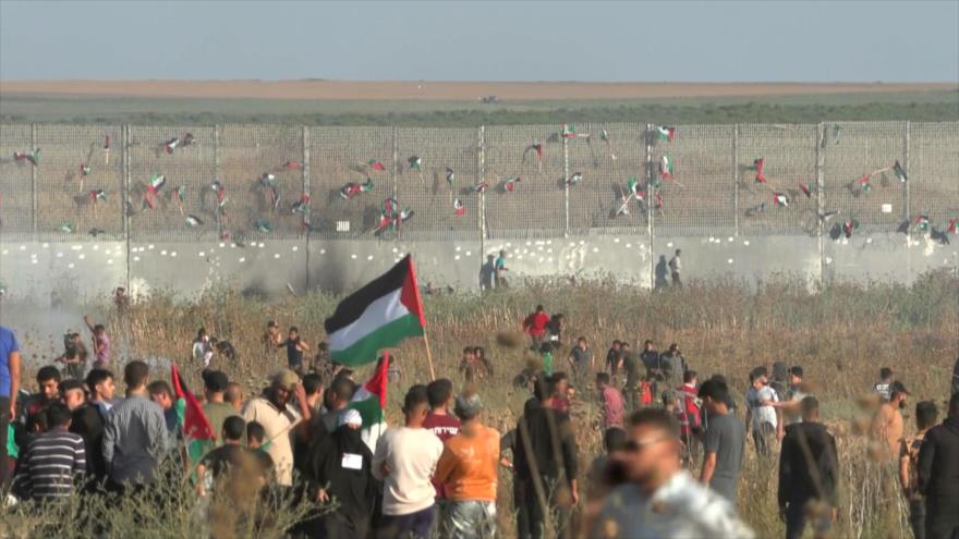 Gazatíes se manifiestan contra la polémica marcha de bandera israelí | HISPANTV