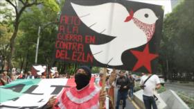 Marchan en México para exigir alto a guerra contra zapatistas