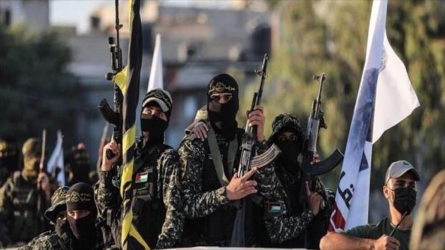 Combatientes de Saraya Al-Quds (Brigadas de Al-Quds), rama militar del movimiento Yihad Islámica en un desfile militar en Gaza. 