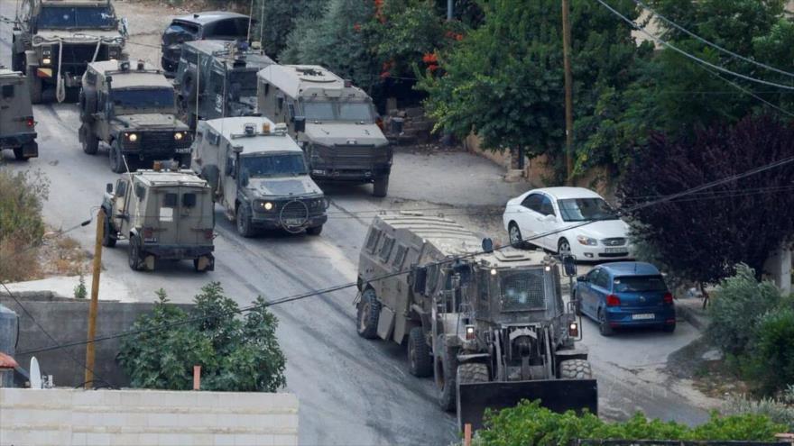 Vehículos militares israelíes desplegados durante una redada en Yenín, en la Cisjordania ocupada, 19 de junio de 2023. (Foto: Reuters)