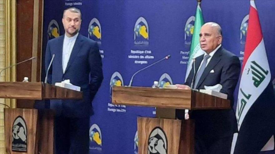 El canciller iraní, Hosein Amir Abdolahian, y su par iraquí, Foad Husein.