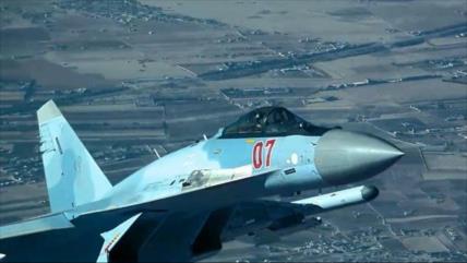 Vídeo: Caza ruso daña dron estadounidense en pleno vuelo en Siria