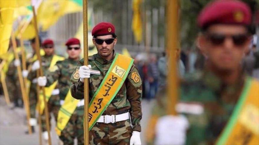 El desfile de las fuerzas del Movimiento de Resistencia Islámica de Irak (Kataib Hezbolá) 