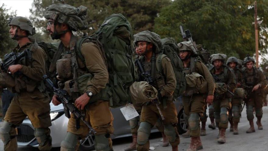 Soldados israelíes patrullan cerca de Gaza. Foto: EFE