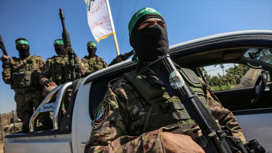 Combatientes de HAMAS en un desfile para conmemorar el aniversario de la guerra de 2014 con Israel, julio de 2023. 