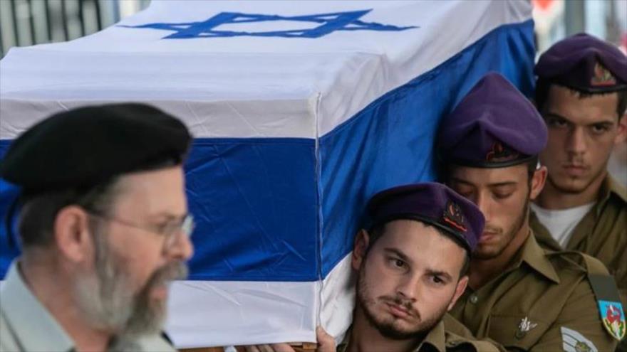 Soldados israelíes participan en el funeral de uno de sus camaradas abatido en los combates en Gaza, noviembre de 2023.