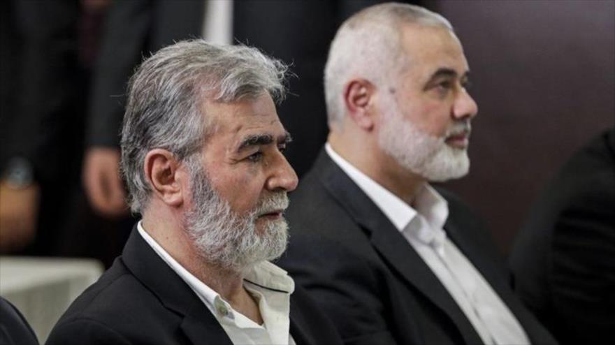 Los líderes de los movimientos palestinos, Ismail Haniya de HAMAS (dcha.) y Ziad al-Najala de Yihad Islámica Palestina.