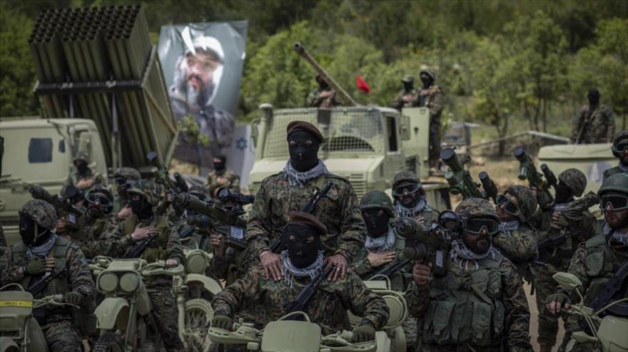 Los combatientes de Hezbolá participan en un ejercicio militar en la frontera con los territorios ocupados por Israel, 21 de mayo de 2023.