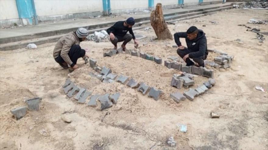 Escuelas convertidas en cementerios en Gaza por ataques israelíes