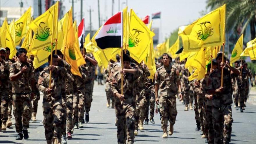 El desfile de las Fuerzas del movimiento Hezbolá iraquí Al-Nuyaba. 