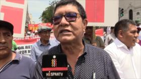Trabajadores peruanos protestan contra incremento de costo de vida