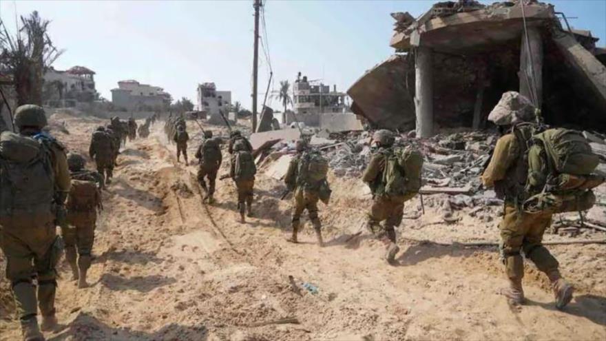 Soldados israelíes durante la operación terrestre del régimen en la asediada Franja de Gaza, noviembre de 2023. (Foto: AP) 