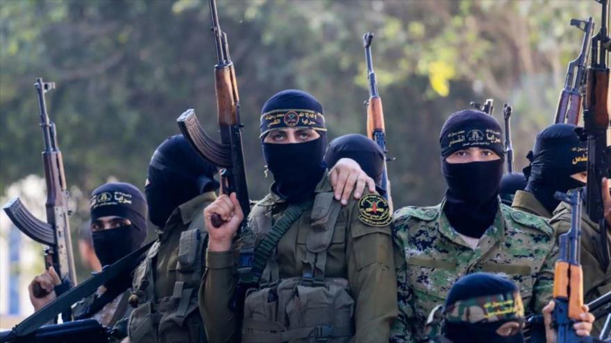 Combatientes de las Brigadas Al-Quds, rama militar de la Yihad Islámica Palestina, en un desfile militar.