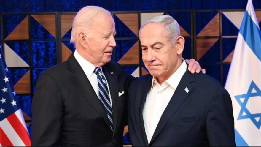 El presidente de EE.UU., Joe Biden, (izq.) y el primer ministro israelí, Benjamín Netanyahu, se reúnen en Tel Aviv, 18 de octubre de 2023.
