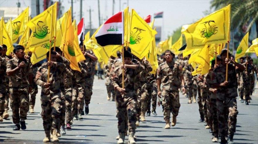 Combatientes del Movimiento de Resistencia Islámica de Irak (Hezbolá al-Nuyaba) en una maniobra. 