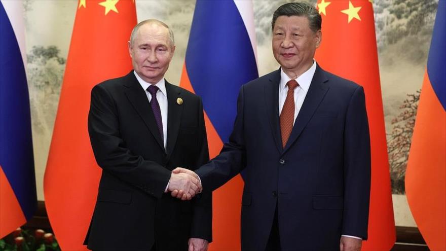Putin visita China y acuerda con XI profundizar nexos estratégicos ruso-chinos