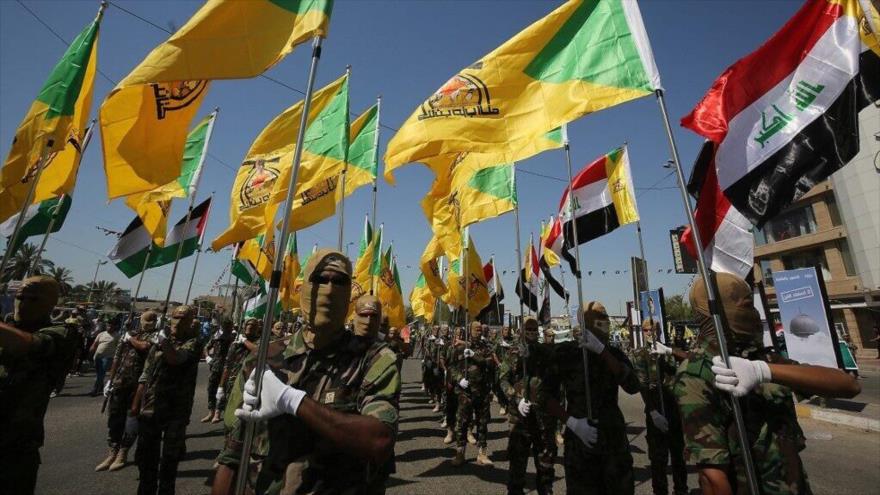 Combatientes de las brigadas de Hezbolá iraquí marchan durante un desfile militar en Bagdad, 31 de mayo de 2019. (Foto: AFP)
