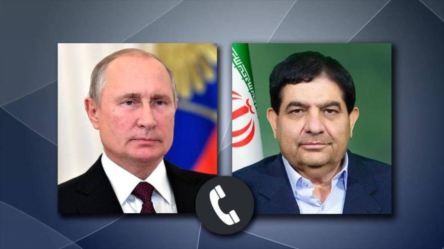 El mandatario interino de Irán, Mohamad Mojber, (dcha.) y el presidente ruso Vladímir Putin.